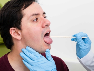 close-up-examination-with-tongue-depressor_11zon
