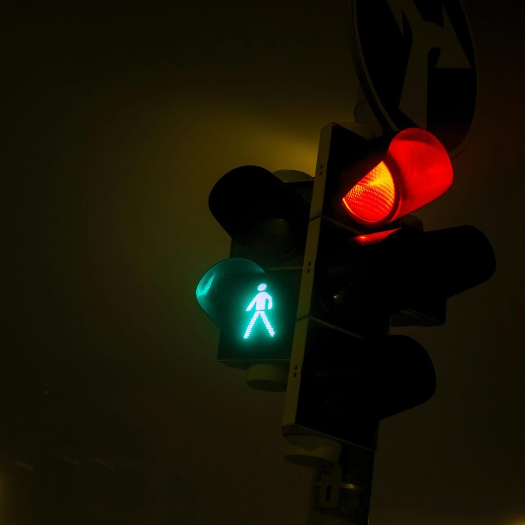 Red and green traffic lights at night in Bratislava, Slovensko.