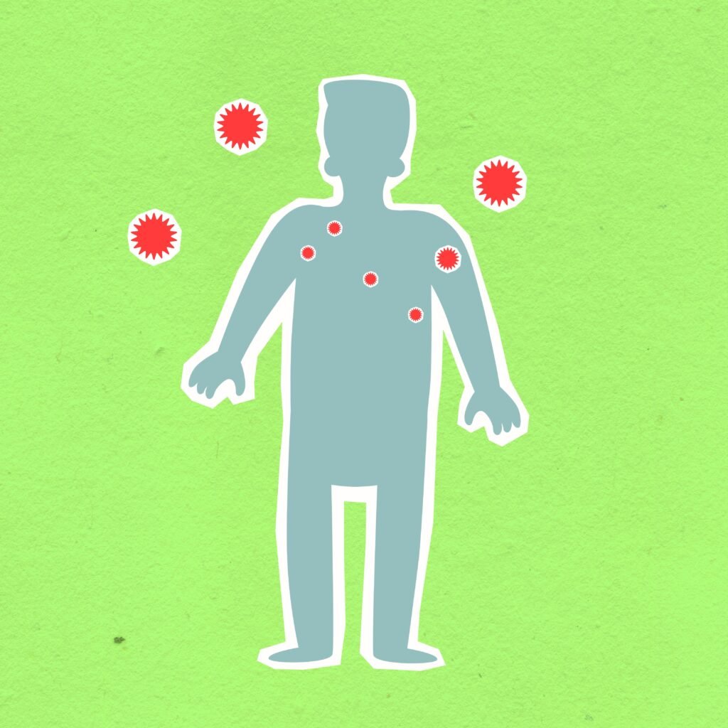 Paper cutout of male silhouette surrounded with many spreading contagious red viruses on green background during dangerous coronavirus disease outbreak