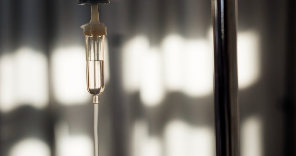 Illustration of nanvuranlat (JPH203) entering a first-line biliary tract cancer clinical trial featuring a new 46-hour continuous intravenous infusion strategy in combination with immune checkpoint inhibitors.