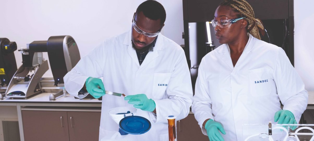 Print - Scientists working in laboratory with samples_11zon