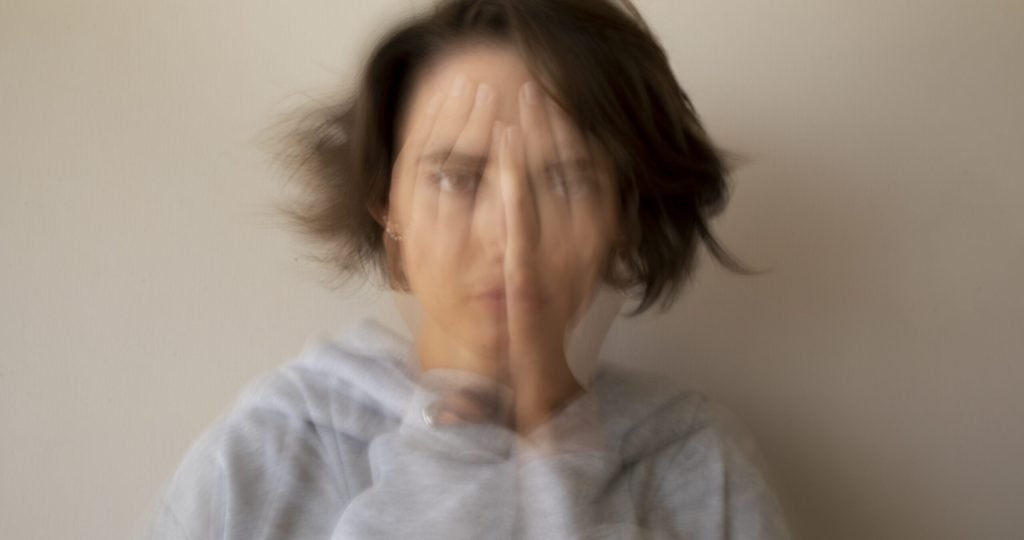 Healthcare professional reviewing treatment patterns for generalized anxiety disorder (GAD) following Definium Therapeutics' large real-world claims study showing high rates of treatment discontinuation and switching.