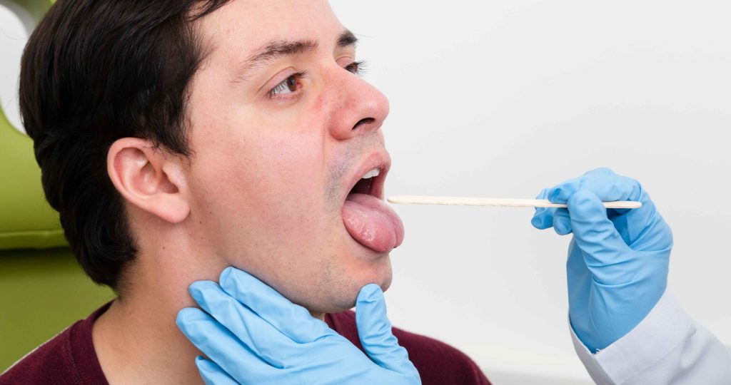 close-up-examination-with-tongue-depressor_11zon
