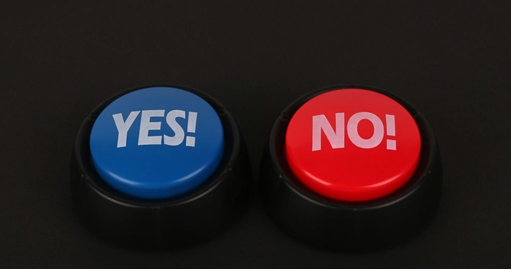 Big Bright Buttons on Black Surface