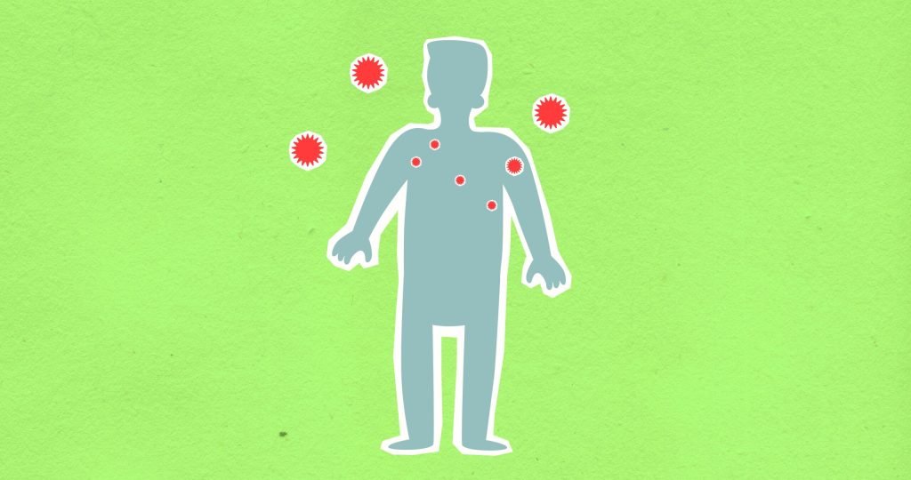 Paper cutout of male silhouette surrounded with many spreading contagious red viruses on green background during dangerous coronavirus disease outbreak