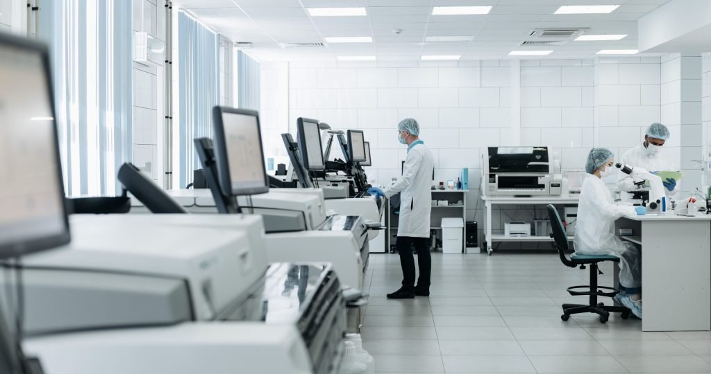 Scientists conducting research in a state-of-the-art laboratory with advanced equipment.