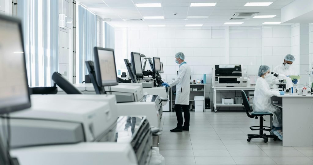 Scientists conducting research in a state-of-the-art laboratory with advanced equipment.