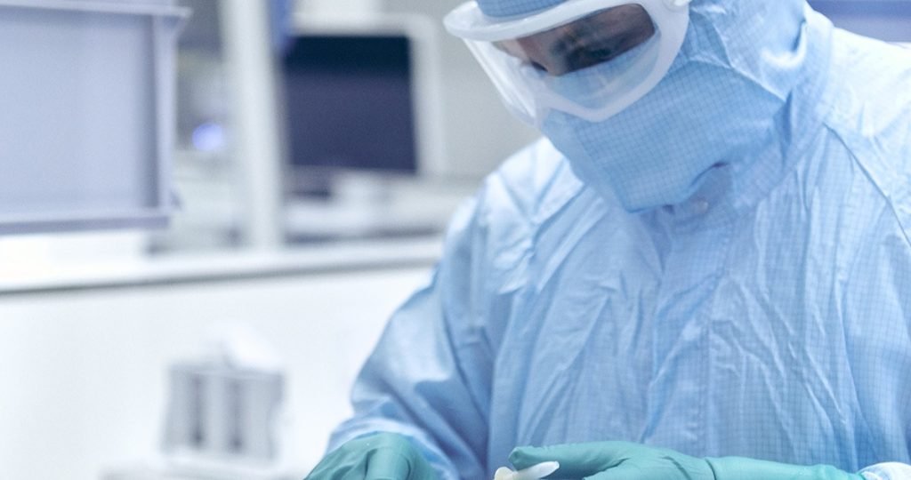 process-operator-prepares-connecting-hose