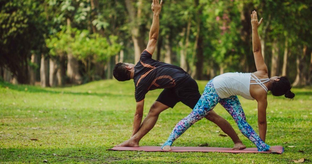 young-couple-enjoying-yoga_11zon